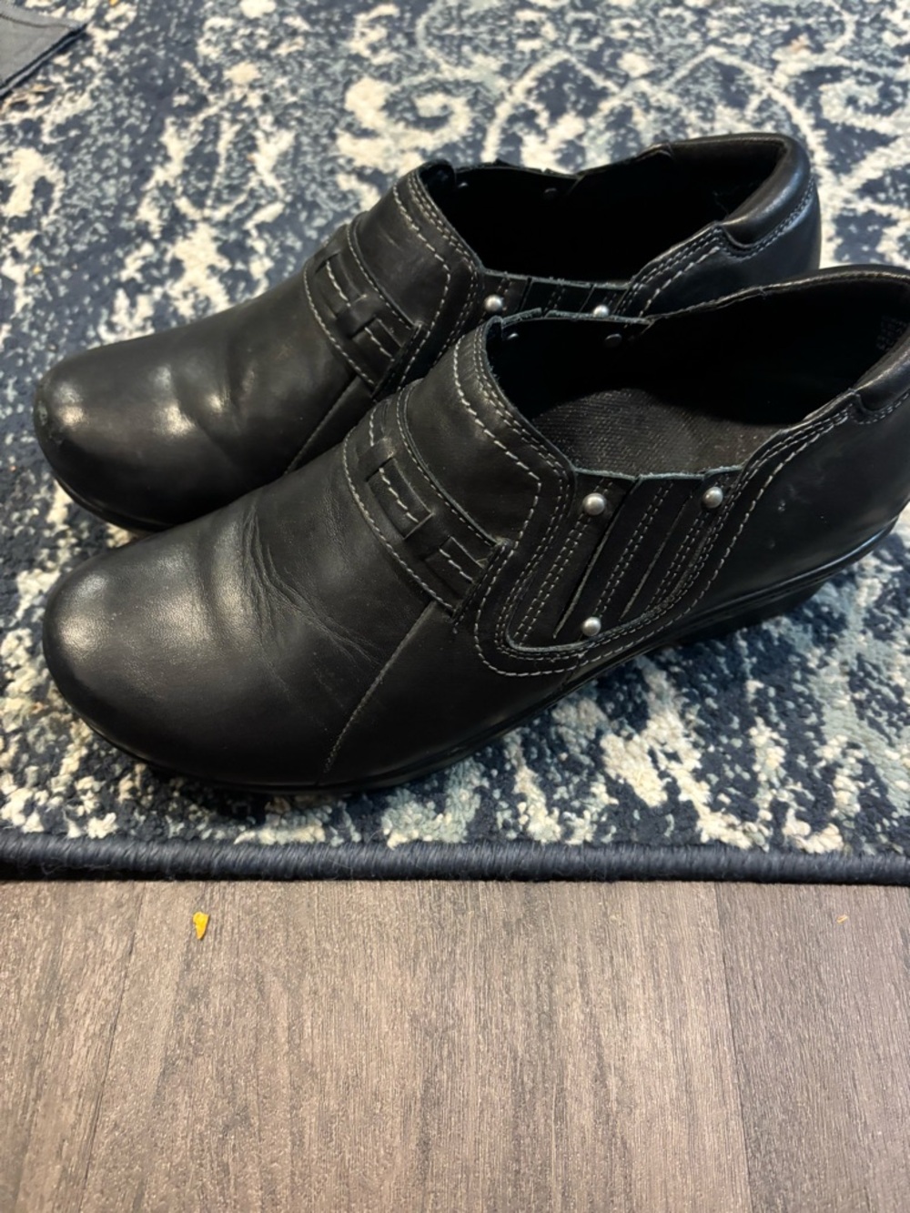 Abeo Black Leather Slip-On Mules with Stud Detail